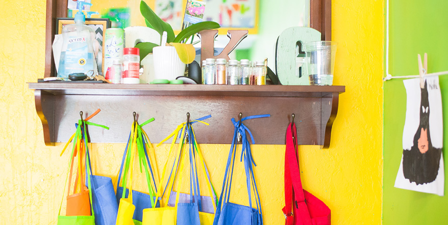 Smocks and paints in a classroom